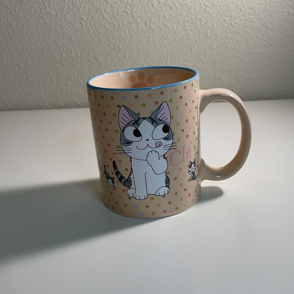 Peach colored cat mug